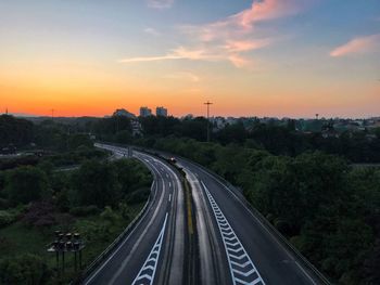 High angle view of highway against sky during sunset