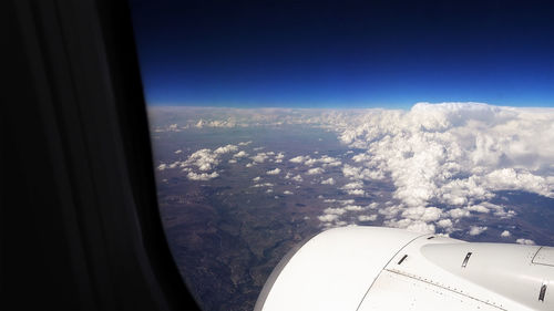 Aerial view of landscape seen from airplane window