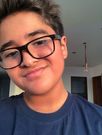 Close-up portrait of smiling young man