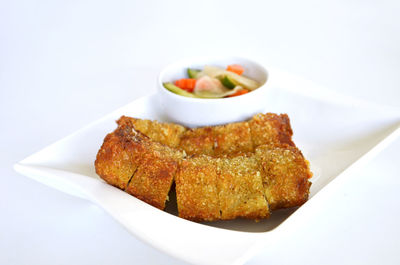 Close-up of served food in plate