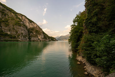 Scenic view of river against sky