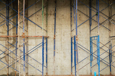 Full frame shot of ladder against wall