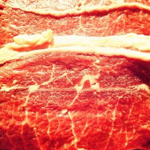Close-up of red fruit on white background