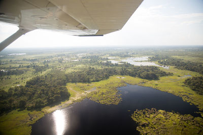 Aerial view of river and landscape against sky