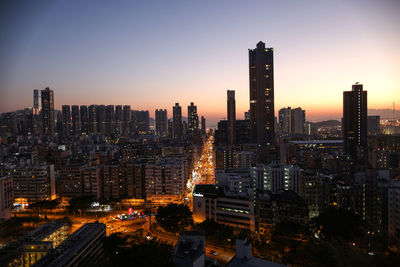 High angle view of cityscape against sky during sunset