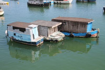 Boats moored in sea