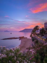 Scenic view of sea against sky at sunset