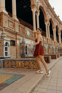 Woman walking at plaza de espana 