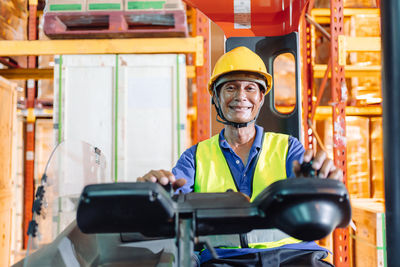 Portrait of man working in office