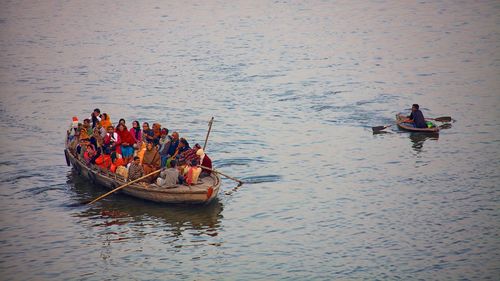 High angle view of people in boat on river