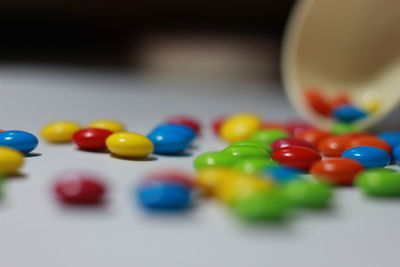 Close-up of multi colored balls on table