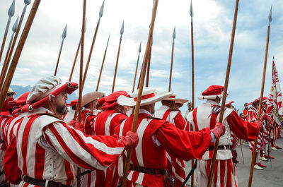 Group of people against sky