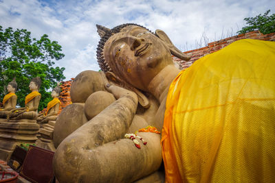 Statue of buddha against sky