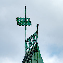 Low angle view of floodlight against sky