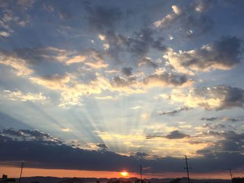 Low angle view of dramatic sky during sunset