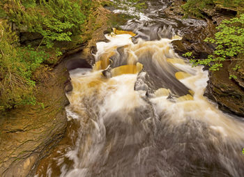 Potholes in the presque isle river in northern michigan