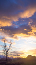 Scenic view of landscape against sky during sunset