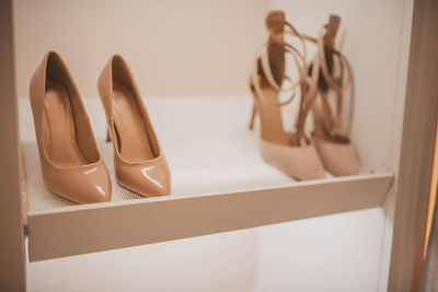 Close-up of shoes on table