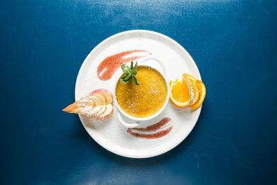 High angle view of fruits in plate on table