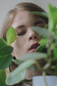 Close-up of young woman looking away