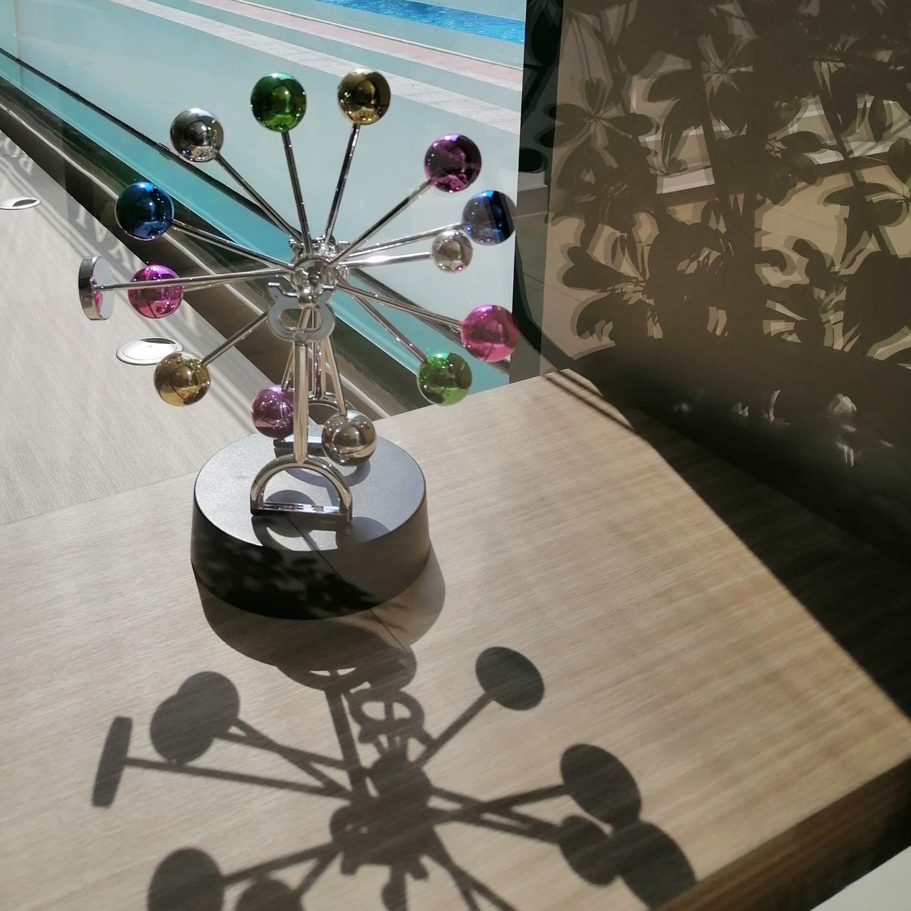 HIGH ANGLE VIEW OF ELECTRIC LAMP ON TABLE