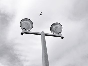 Low angle view of street light against sky