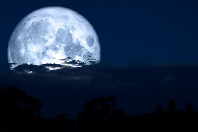 Scenic view of moon against sky at night