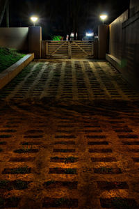 Illuminated street lights at night
