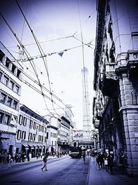 People walking on street in city