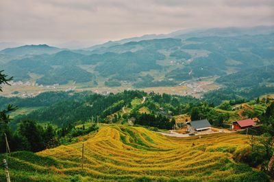 High angle view of agricultural field and mountains