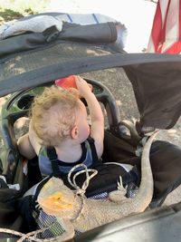 Cute boy in car