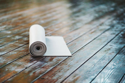 High angle view of exercise mat on hardwood floor