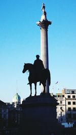 Low angle view of statue against clear sky