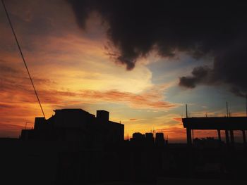 Built structure against sunset sky