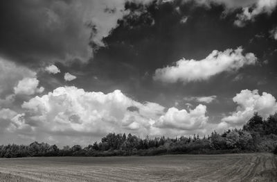 Panoramic view of field against sky