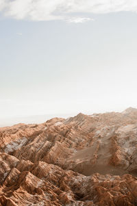 Scenic view of rock formations against sky