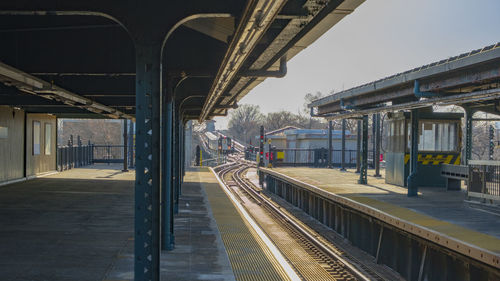 Railroad station platform against sky