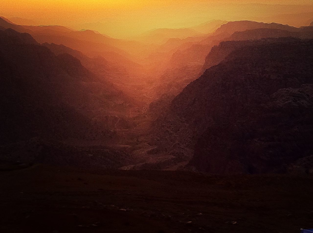 mountain, tranquil scene, scenics, tranquility, mountain range, beauty in nature, landscape, physical geography, geology, nature, idyllic, non-urban scene, rock formation, sunset, sky, remote, rock - object, fog, majestic, outdoors