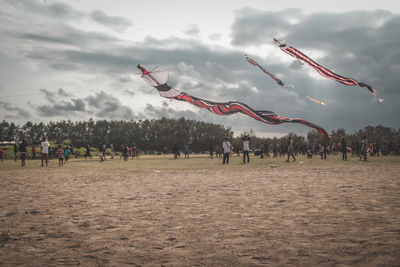 Group of people playing in the sky