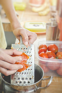 Midsection of man preparing food