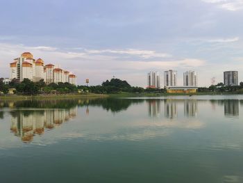 Reflection of buildings in lake