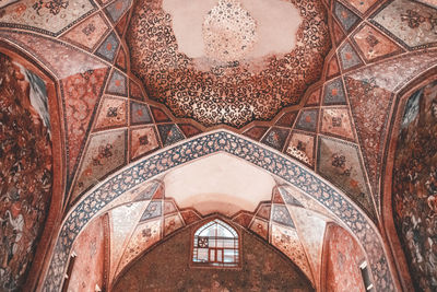 View of ornate ceiling of building