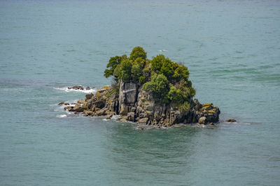 Scenic view of rock formation in sea