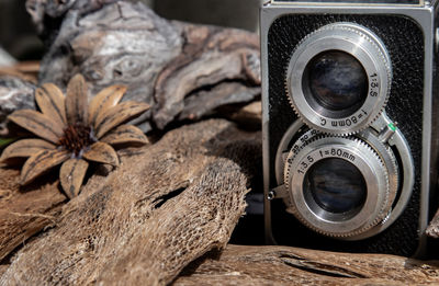 Close-up of camera on table