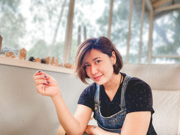 Portrait of a smiling young woman