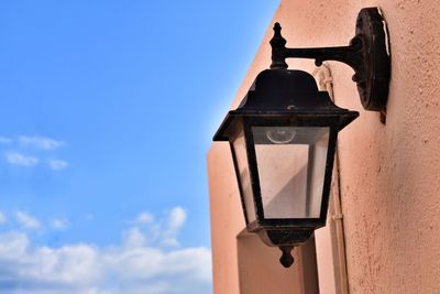 Low angle view of street light against sky