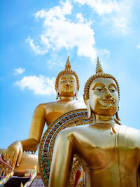 Low angle view of statue against sky