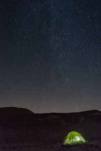 Scenic view of star field against sky at night