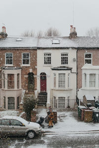 Houses in city during winter