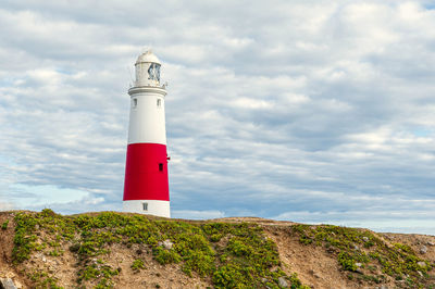 Portland bill lighthouse. dorset coast in isle of portland, uk. a waymark guiding vessels.